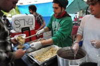 An Occupy Portland volunteer serves food at the occupation site’s kitchen.