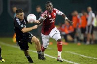 Desperate push: Portland midfielder Kalif Alhassan (#11, right) tries to push past a defender, as the Timbers fought but failed to make the MLS playoffs in 2011.