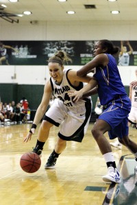 Inside push: Portland State sophomore forward Allie Brock (#34) dips her shoulder and drives to the hole with determination.