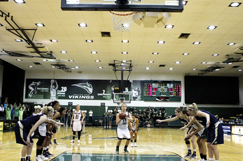 Under Pressure: Sophomore Kate Lanz steps up to the line to take a critical free throw. Lanz, Courtney VanBrocklin (lower left) and Eryn Jones (lower right) combined to put the Vikings over visiting Northern Colorado by  just one point