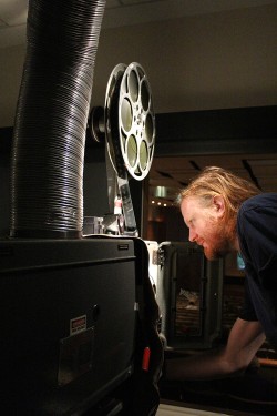 Reel work: Portland Art Museum projectionist Jason Longwoll  prepares for the screening of The Snows of Kilimanjaro.