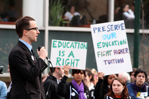 Student body President of Cascade Portland Community College, Douglas Taylor, gives PCC presence and support at the Rally