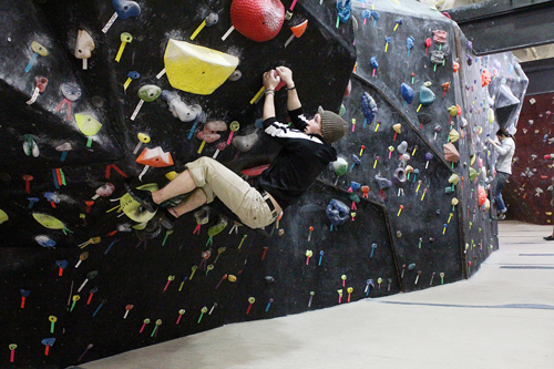 Over the top: Rock climbing in the wee hours at The Circuit Gym.