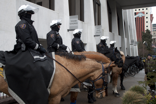 Mounted police watched from the sidelines as protesters stood on Southwest 4th Avenue outside the Wells Fargo Center.
