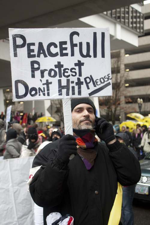 One protester carried a sign advocating against police brutality.