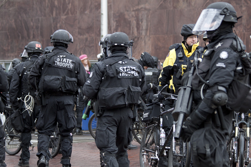 As the march gained momentum, police in full riot gear appeared at the scene.