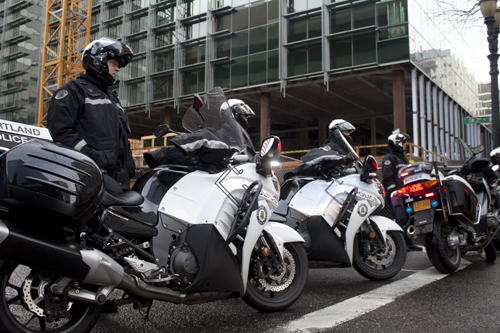 Police officers used their motorcycles to block off streets that were occupied by marching protesters.