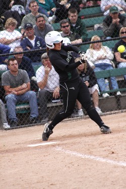 Swinging for the fences: Sophomore Crysta Conn takes a swing. The softball team has faced difficulties finishing runs after getting on base.