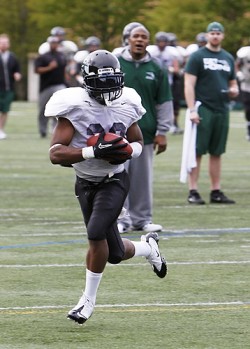 Fun run: Sophomore running back Shaquille Richard streaks across the field. Richard had 101 carries last year, and could feature prominently in 2012.