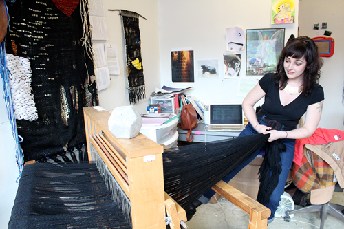 Jessica Hickey prepares the loom for a guardian weaving in her studio.