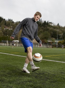 Club contention in soccer city: Midfielder Corey Lewis shows off his ball-handling skills during a practice at Stott Field. The team is hard at work preparing for the University of Oregon World Cup tournament. 