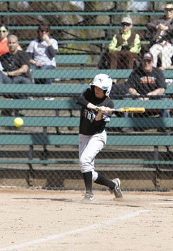 Familiar faces: Senior centerfielder Jenna Krogh takes a swing. Krogh, the team’s only Portland native, also has the most at-bats on the team: 112. 