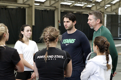 Courting Success: Head coach Jay Sterling (right) and assistant coach Angelo Niculesco (center) speak to the women’s team after a practice. The Vikings will get their last shot at a conference win this season as they close out their schedule at home. 