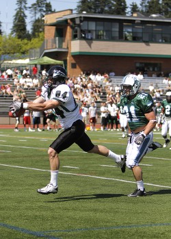 Perfect pass: Wide receiver Justin Monahan snatches the ball. The Vikings are still looking for a replacement for star quarterback Connor Kavanaugh.