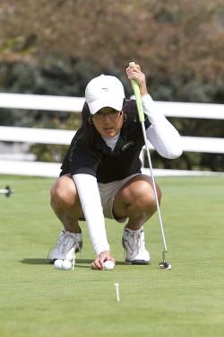 A tough act to follow: All-Big Sky Conference player Britney Yada sets her ball down on the green. Yada and her peers struggled to live up to expectations from last year, but improved toward the end of the season.