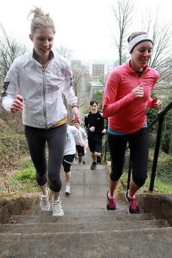 Runners high: Run Around Portland club members ascend a set of stairs near Portland State. As spring wears on, new running opportunities are becoming available around the city.