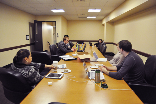 The student fee committee meets to discuss budget issues.