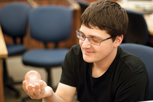 Nick Day, a chemistry graduate student, holds a ball of Polyacrylamide polymer, a hydrophilic gel.