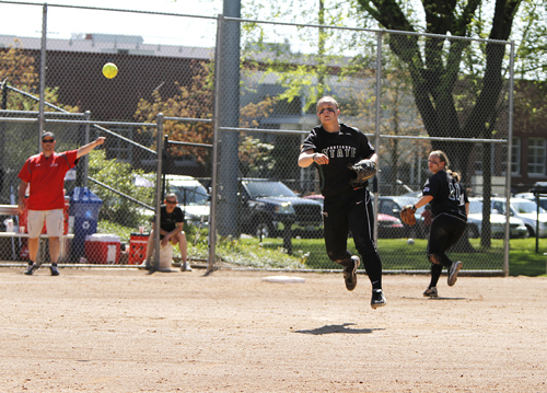 A whole new ballgame: Sophomore infielder Crysta Conn throws the ball in. The Vikings saw new and old faces emerge as leaders in this, their last year in the Pacific Coast Softball Conference. 