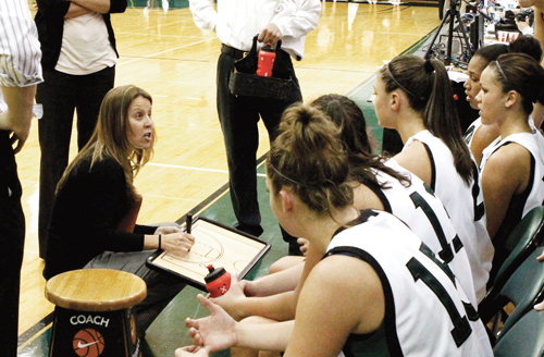 Big Loss: Peg Swadener coaches a few players during the 2011–12 season. She moves to Willamette University this year.