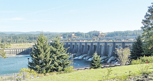 The Bonneville dam spans the Columbia River. The Bonneville Power Administration distributes electrical power generated at the dam. Photo © Linda Garrison.