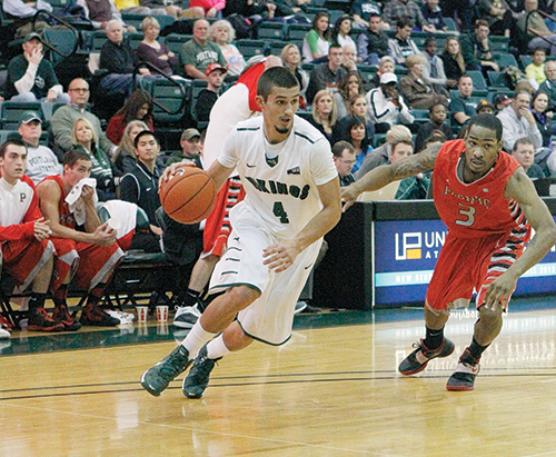 Michael Harthun finds an opening and cuts to the basket for the Vikings. The senior guard has been a reliable outside threat this season. Photo by Karl Kuchs.