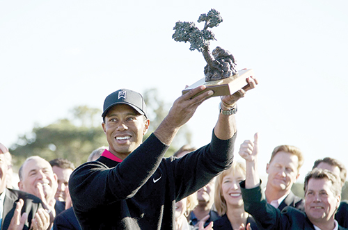 Tiger woods won for the eighth time at Torrey Pines, a course he has played since his junior days.  Photo © AP.