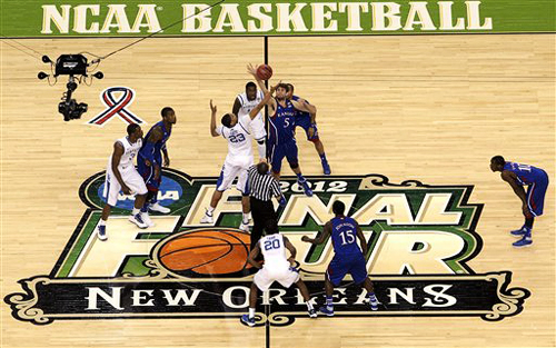 Madness arrives every spring in the form of the NCAA men’s basketball championship, in which 68 teams will compete for a shot at the title. © AP photo/david J. Phillip.