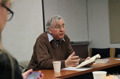 Dick Davis, a guest speaker from Ohio State University, lectures about Iranian women writers on Thursday. Photo Kayla Nguyen.