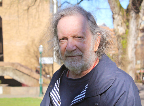 Joe Bashlow, a 77-year-old man who is auditing poetry classes at PSU, has been attending classes and letting his hair grow since his wife died two years ago. Photo by  Cassandra Moore. 