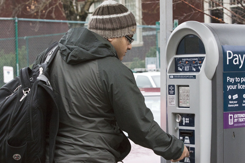 Pay-by-plate meters are now in place at the Shattuck and Art Building lots. Parking Structure 1 meters are slated to be replaced in fall term. Photo by Jinyi Qi.