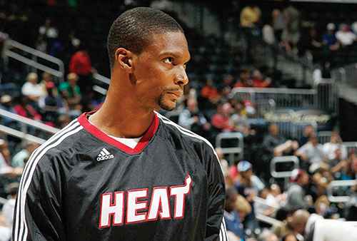 Chris Bosh is just one of many reasons that the Miami Heat have put together the longest winning streak in the NBA since 2008. Photo by © Kevin C. Cox.