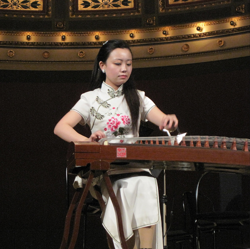 Guzheng-ing H.A.M.: Ruisi Li plucks the strings of the guzheng, an ancient Chinese instrument. Li will be performing on campus this weekend as part of the Chinese New Year celebration. Photo courtesy of Ruisi Li.