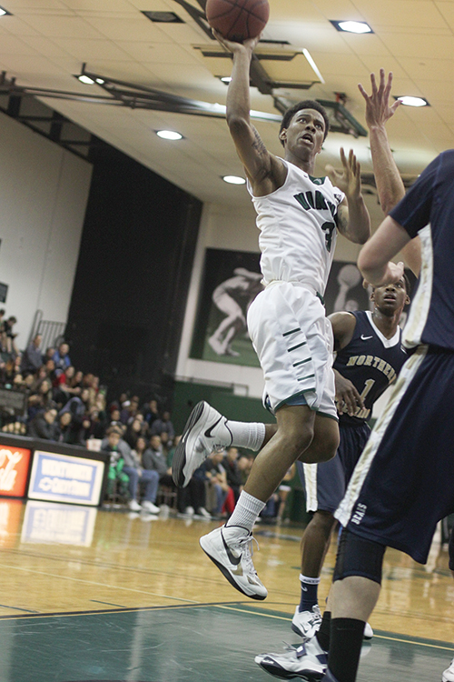 Dre Winston Jr. goes for two in traffic. Photo by Miles Sanguinetti.