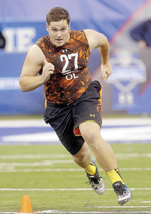 Luke Joeckel is projected to go no. 1 to the Kansas City Chiefs in the 2013 NFL draft. Photo © Fave Martin/AP