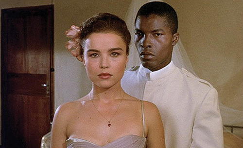 Unlikely lovers Aimee (Guilia Buschi) and Protee (Isaach De Bankole) flout cultural norms in Claire Denis’ 1988 film Chocolat, which will be showing at Northwest Film Center. Photo © Metro-goldwyn Mayer Studios Inc.