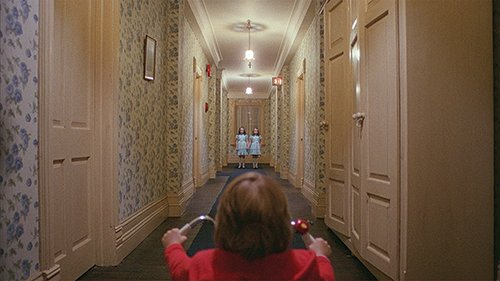 Those aren’t the doublemint twins: Danny gets more redrum than he bargined for in Stanly Kubrick’s classic 1980 thriller, The Shining. Photo by © Warner Bros. Entertainment.