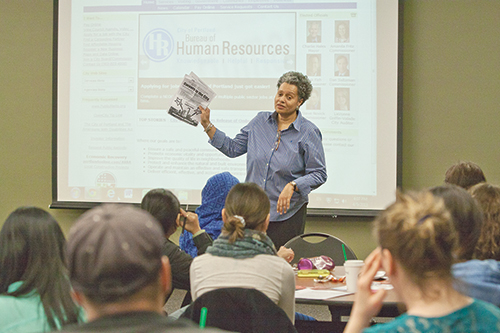 Diane Avery, a development analyst for the city of Portland, speaks to students about jobs in the public sector on Tuesday. Photo by Jinyi Qi.