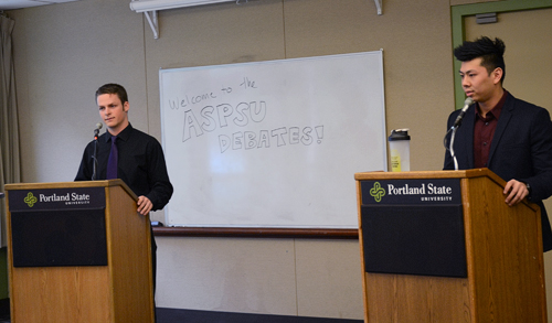Harris Foster (left) and James Au answer questions at Thursday's ASPSU president debate. Photo by Riza Liu.