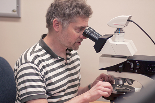 Alex Ruzicka, professor of geology. Fields of expertise include planetary sciences and earth sciences. Earned his doctoral degree from the University of Arizona. Photo by Miles Sanguinetti. 