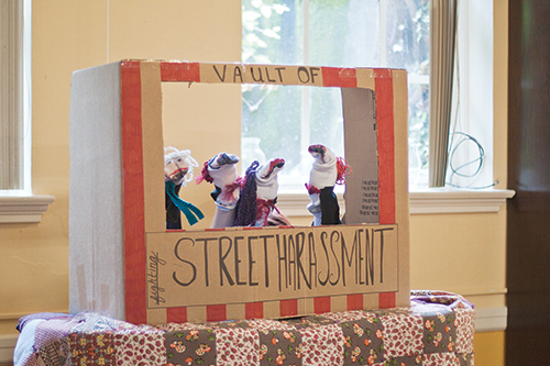 Sock-puppet performances at the “Hollaback!” event taught attendees about ways to confront street harassment. Photo by Miles Sanguinetti