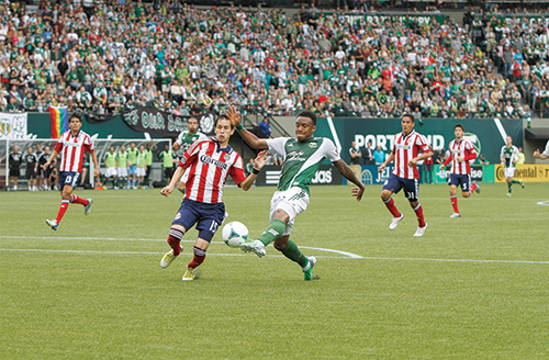 Rodney wallace, right, provided Portland’s first goal against Chivas USA, later setting up Diego Valeri for another score in the Timbers’ 3–0 victory. Photo Karl Kuchs