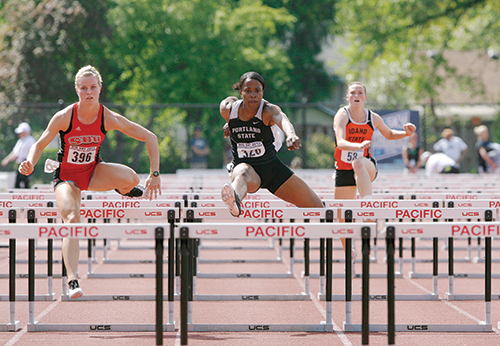 Joenisha Vinson, right, was named the Big Sky meet’s most outstanding performer. Photo by Karl Kuchs.  