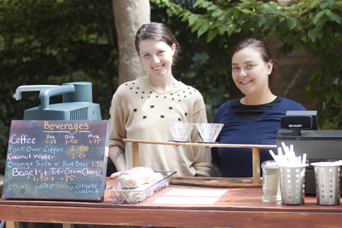Elizabeth Bommarito, left, and Natalie Fraver, right, work the new Food for Thought food cart, now open. Photo Miles Sanguinetti.