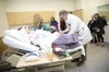 Alan J. Hunter, M.D. and Jeanne-Marie Guise, M.D., MPH demonstrate how to deliver a child in one of the teaching simulation rooms. Photo by Christopher Sohler