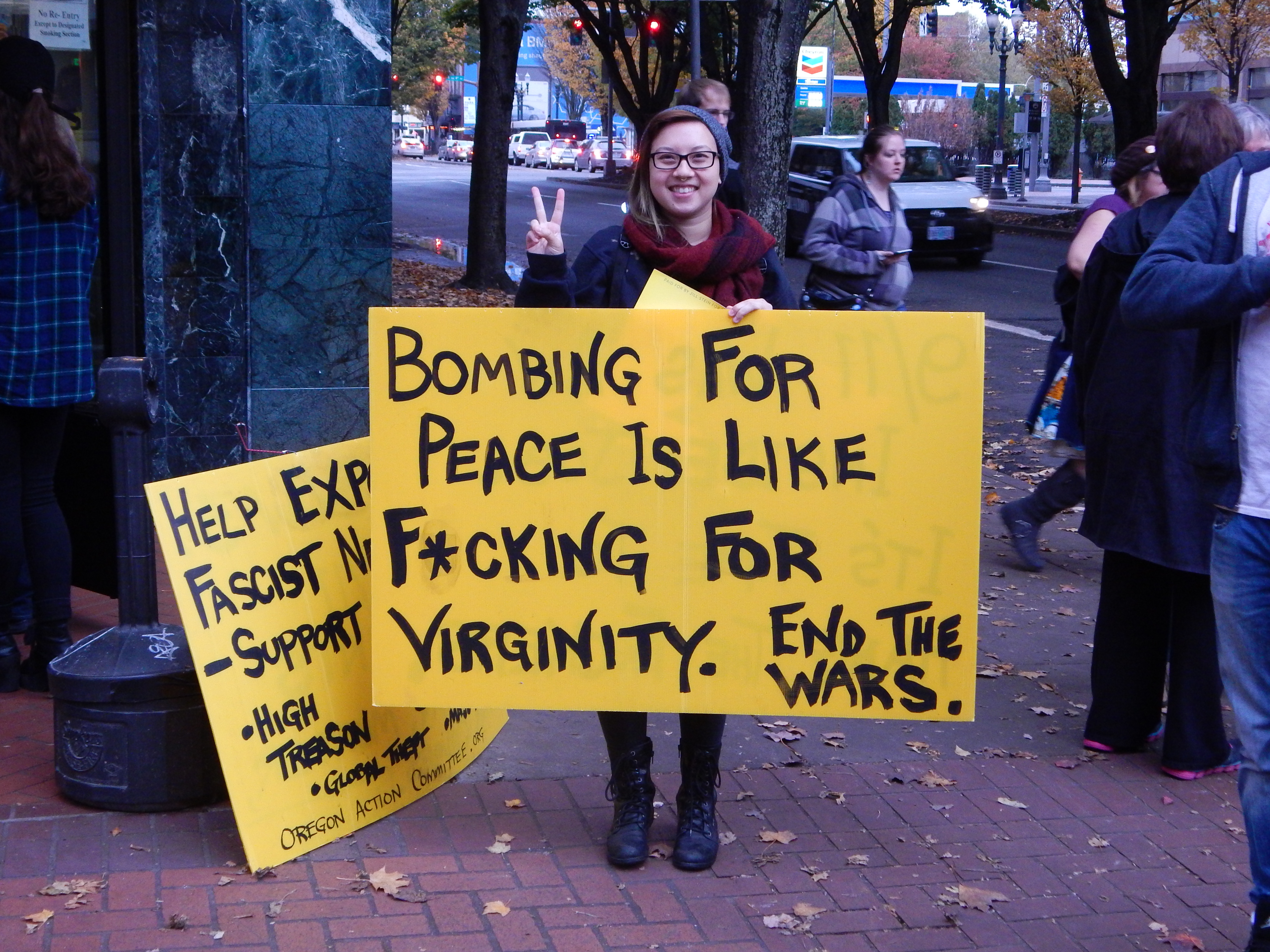 Jill Stein supporters bring signs to the event. Matthew Andrews/PSU Vanguard